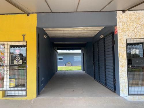 a hallway leading into a building with a garage at El Despertar in Concepción del Uruguay