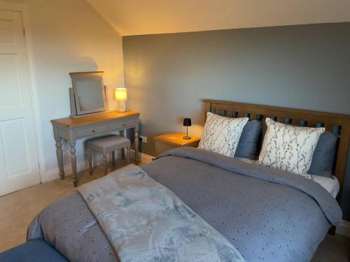 Ein Bett oder Betten in einem Zimmer der Unterkunft Hazeltree Lodge