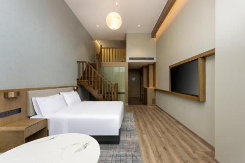 Posezení v ubytování Holiday Inn Jiuhua Mountain Hot Spring by IHG