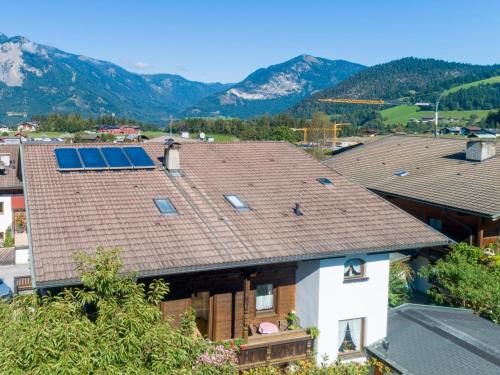 an image of a house with solar panels on the roof at Johanna und Sonja in Scheffach