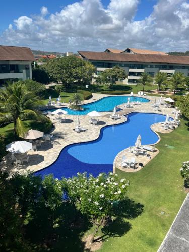 Bazén v ubytování Flats de Luxo - Carneiros Beach Resort nebo v jeho okolí