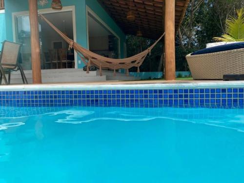 Kolam renang di atau dekat dengan Casa de praia deslumbrante em Massarandupió