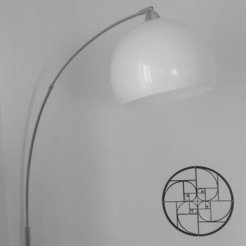 a close up of a lamp with a circle on it at Leonardo Da Vinci's House in Pisa