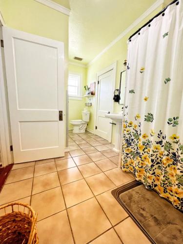a bathroom with a shower and a toilet at FourOaks in Sebring
