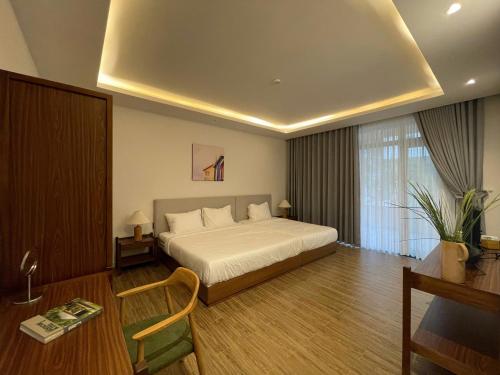 Postel nebo postele na pokoji v ubytování Field Villa Hoàng Diệu