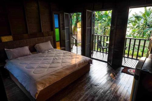 Llit o llits en una habitació de Rai Phuchat
