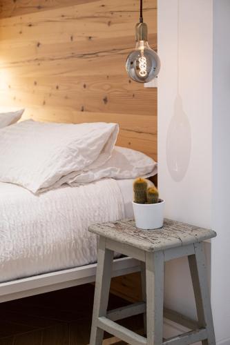 Una cama o camas en una habitación de Casa Vertigo