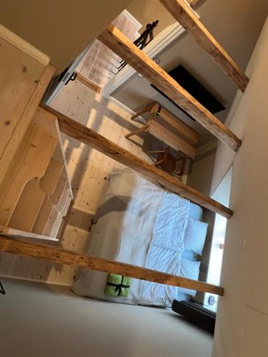 a loft bed in a tiny house at Byhuset - Hems 60 in Vejle