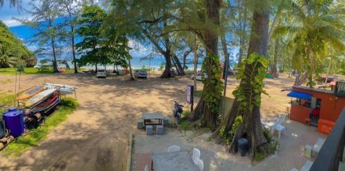 an aerial view of a park with a car parked next to a tree at Hat yao Seaview Beach Room in Trang