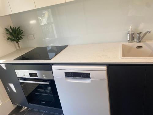 Η κουζίνα ή μικρή κουζίνα στο Middle Rock Beach Unit 2