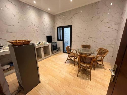 Kuchyň nebo kuchyňský kout v ubytování Oasis appartement