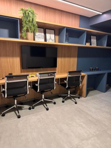 Studio Design 3 - 409にあるテレビまたはエンターテインメントセンター