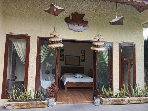 Katil atau katil-katil dalam bilik di Calmness Villa Syariah