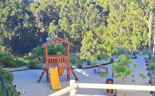 a playground with a slide and a play structure at Reñaca I Nuevo I Luminoso I Circuito Trekking in Viña del Mar