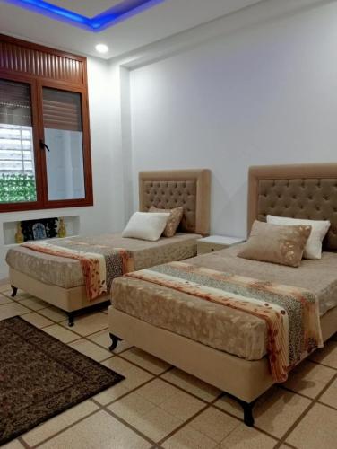 Postel nebo postele na pokoji v ubytování Luxurious in Heart of Tunis