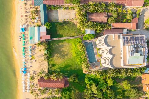 an overhead view of a resort next to a beach at Maris Beach Hotel Phu Quoc in Phu Quoc