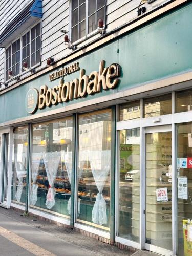 a storefront of a boston bake store on a street at 北海道大学ENYA-n17 in Sapporo