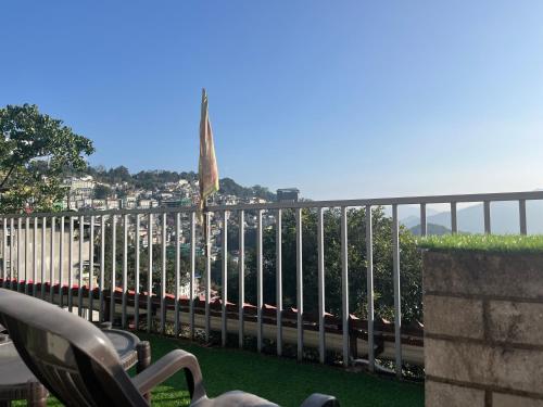 a view of a city from a balcony at Bahar Retreat And Spa , Gangtok in Gangtok