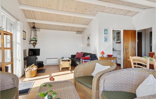 a living room with chairs and a couch at Nice Home In Børkop With Wifi in Børkop