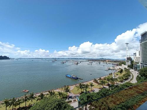 a view of a river with boats in the water at Bạch Đằng Hạ Long Hotel in Ha Long