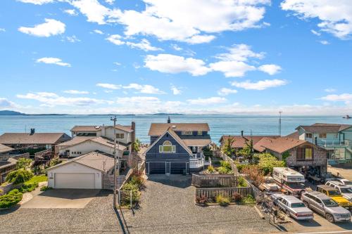 an aerial view of a residential neighborhood with cars parked in a parking lot at SANDY POINT 6 BEDS 3 BATHS BEACH HOUSE WITH AMAZING VIEWS in Ferndale