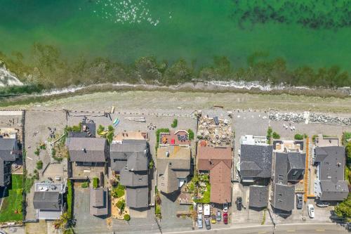 an aerial view of houses and the beach at SANDY POINT 6 BEDS 3 BATHS BEACH HOUSE WITH AMAZING VIEWS in Ferndale