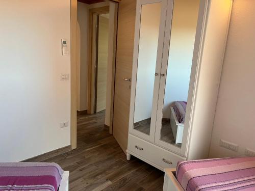 Cama o camas de una habitación en Residenza Limpiddu