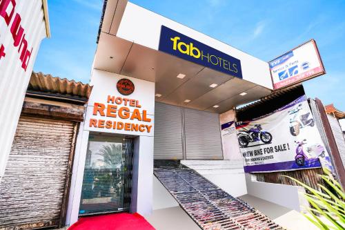a sign for a notional retail dealership at FabHotel RR Residency - Near BKC in Mumbai