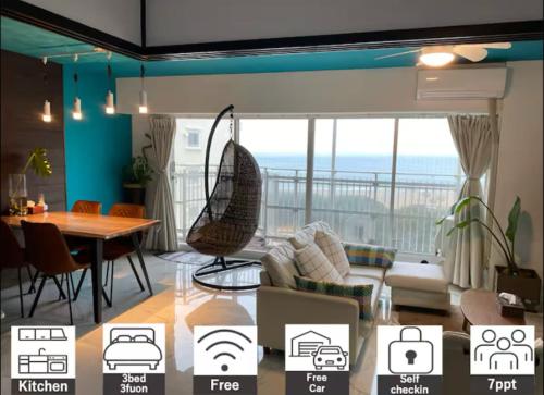 a living room with a couch and a table at Onjukuオシャンビューアジアントロピカル貸し切り御宿駅5分海岸2分 in Onjuku