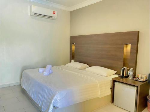 Postel nebo postele na pokoji v ubytování Ziella De Villa