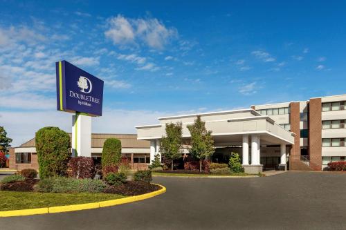 a building with a sign in front of it at DoubleTree by Hilton Boston/Westborough in Westborough