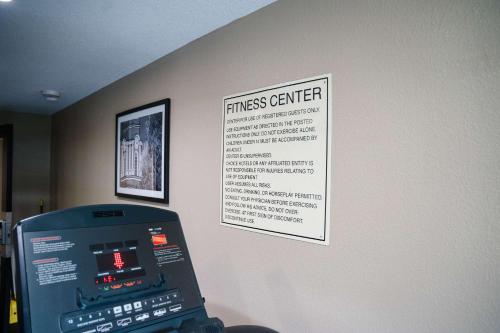a sign on the wall of a fitness center at Sleep Inn & Suites West Knoxville in Knoxville
