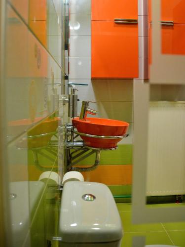 a bathroom with a sink and a toilet at V for Vacation in Ioannina