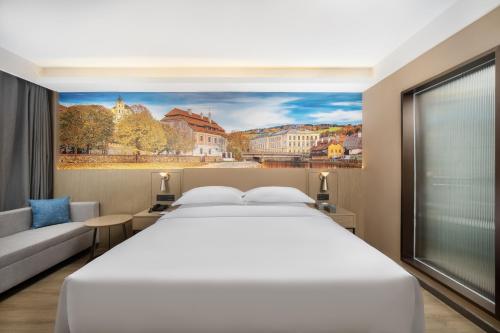 Postel nebo postele na pokoji v ubytování Landis Hotel