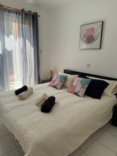 Postel nebo postele na pokoji v ubytování Regina Gardens 3