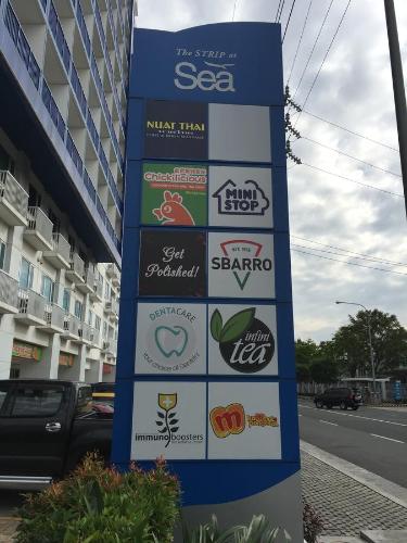 a sign on the side of a street at Sea Residences MoA Manila in Manila