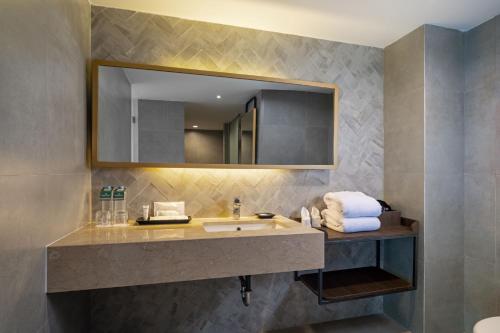Koupelna v ubytování Hotel Santika Lahat