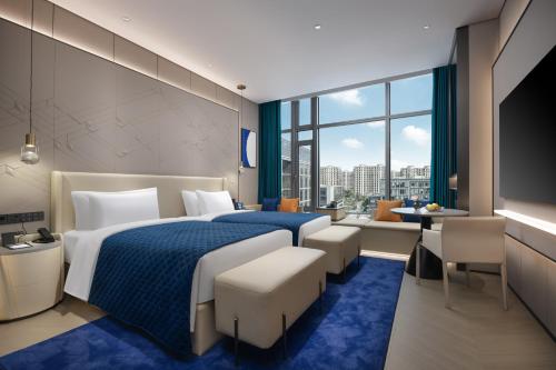 Voodi või voodid majutusasutuse Vance Hotel - Alibaba Xixi C District toas