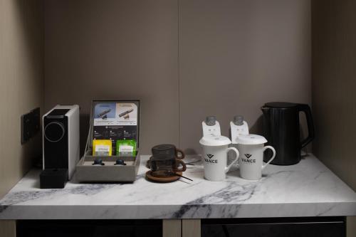 Kemudahan buat kopi dan teh di Vance Hotel - Alibaba Xixi C District