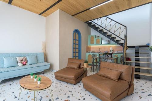 Ein Sitzbereich in der Unterkunft Marée Guest House