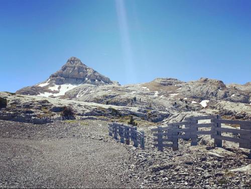 a mountain with a fence on the side of it at BÈTH CÈU - 4 PERS - Appart vacances- in Arette