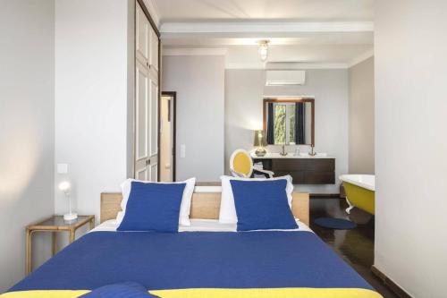 En eller flere senge i et værelse på Villa Sea Shore by Villa Plus