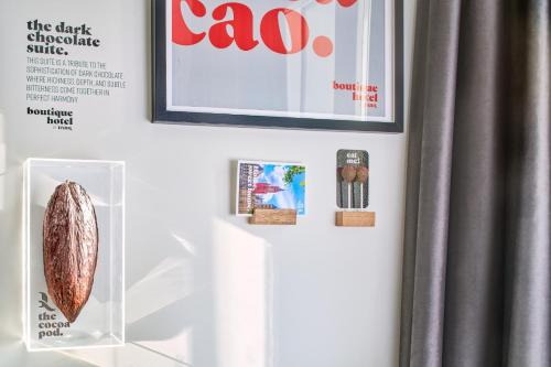 a white refrigerator with a acorn in a display case at Boutique Hotel DARQ in Maastricht