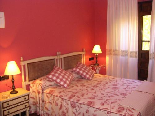 Katil atau katil-katil dalam bilik di Hotel Posada Molino del Cubo