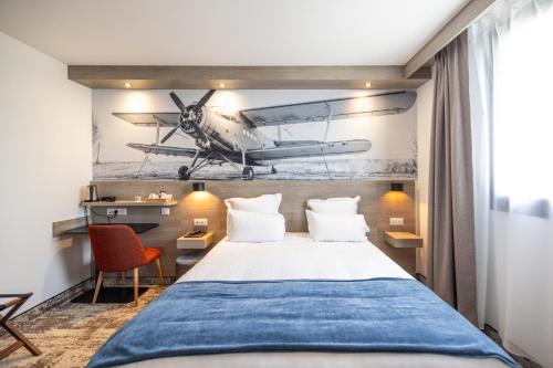 Postel nebo postele na pokoji v ubytování Best Western Saint Exupéry Eysines - Bordeaux Ouest