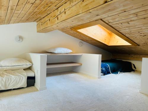 Postel nebo postele na pokoji v ubytování Grand appartement rénové de 110m2 aux Contamines