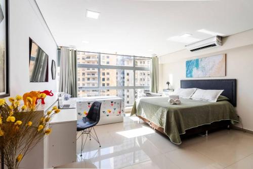 Una cama o camas en una habitación de Descolado e Completo SP