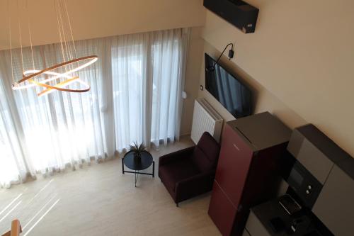 Μια τηλεόραση ή/και κέντρο ψυχαγωγίας στο AAA Luxury Residences