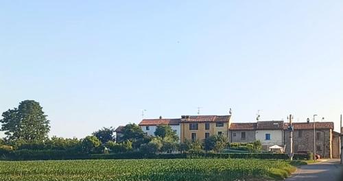 a group of buildings on the side of a road at CASA Siloah in San Martino della Battaglia