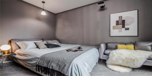 Postel nebo postele na pokoji v ubytování 上海柠檬汁民宿 Shanghai lemon juic B&B -Shanghai Lemon Deluxe Room外滩南京东路步行街